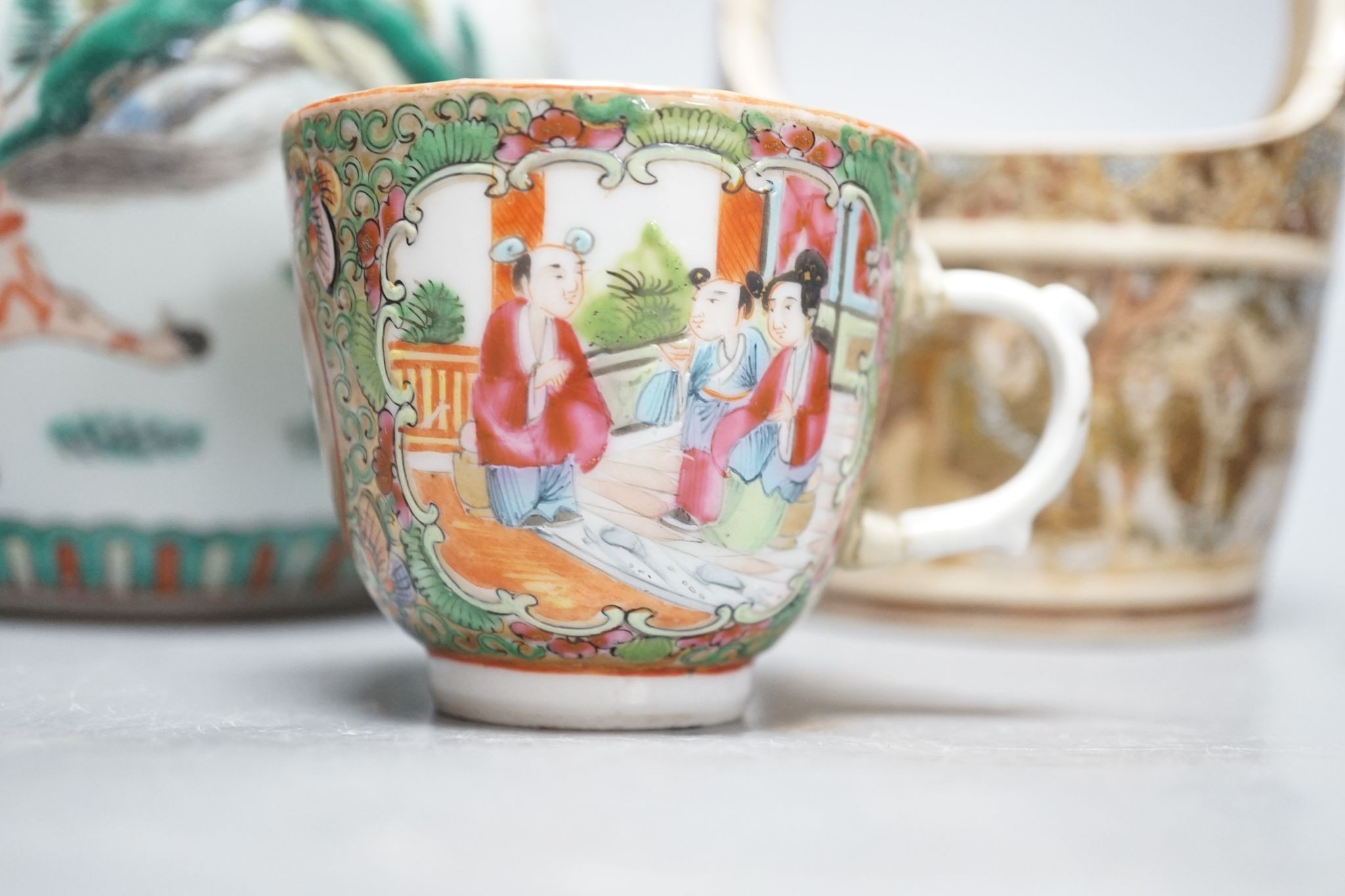 A Chinese famille verte jar, a Chinese enamelled porcelain stem dish, a famille rose cup and a Japanese Satsuma pottery model of a bucket, tallest 15.5cm